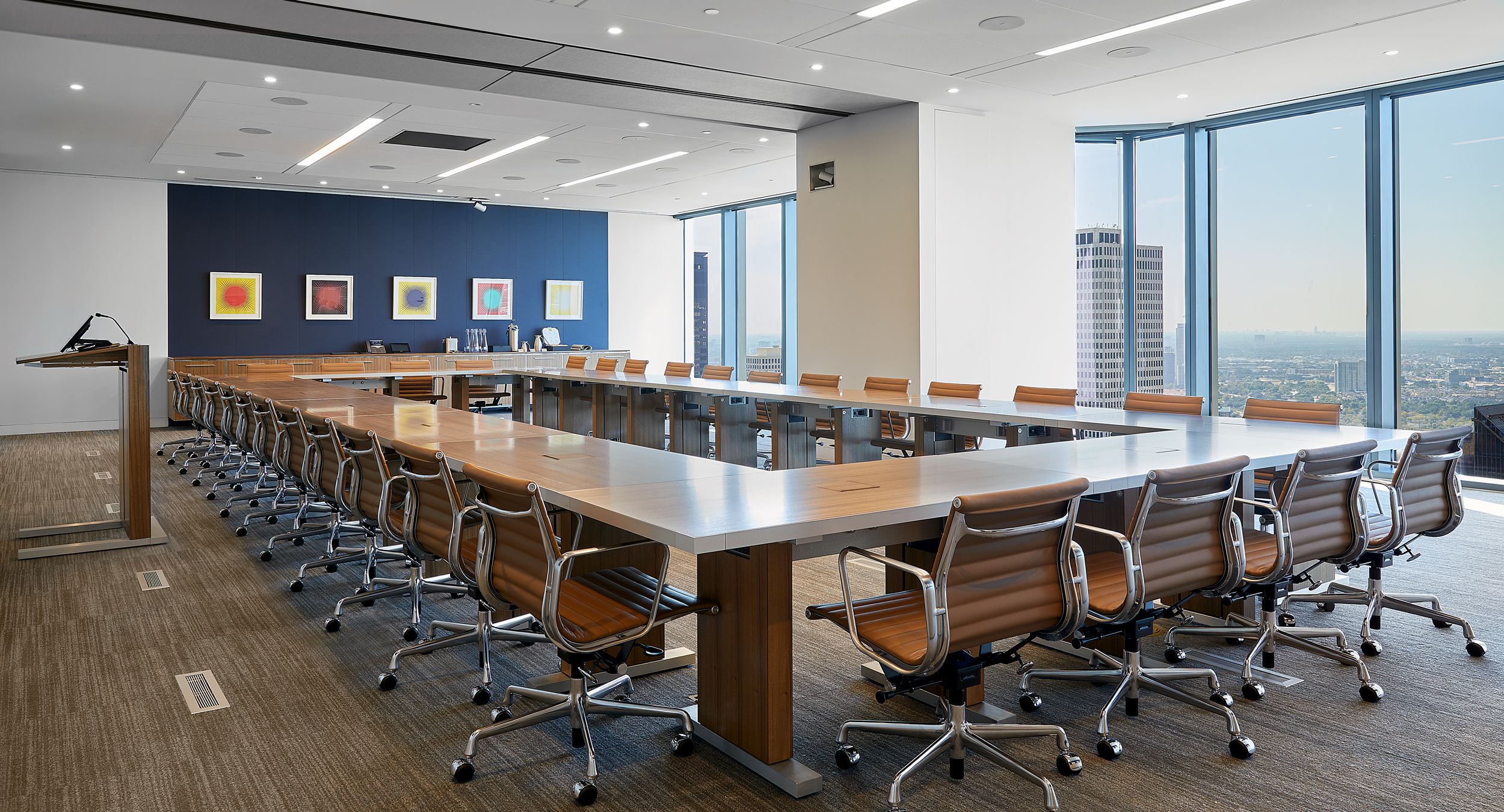 MOTUS tables in Paldao and Brushed Aluminum result in an executive meeting room that is as beautiful as it is functional.